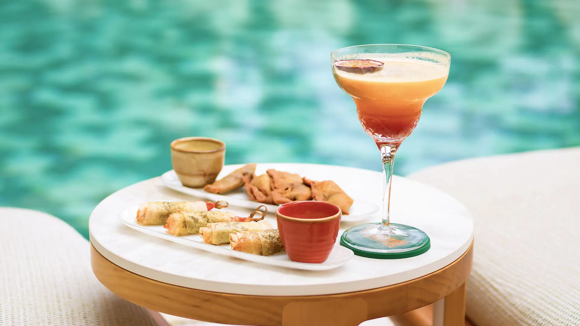 NCEHR-P0707-Cocktails-Pool-Tapas-Spread.16×9